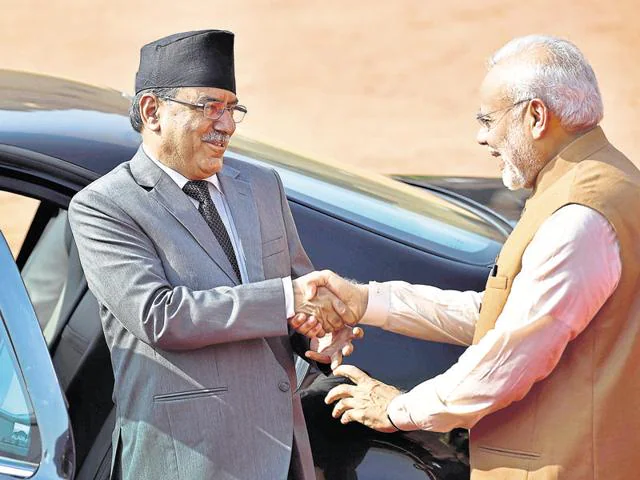Prime Minister Narendra Modi welcomes his Nepalese counterpart Pushpa Kamal Dahal Prachanda at the Rashtrapati Bhavan in New Delhi on Friday.(Ajay Aggarwal/HT)