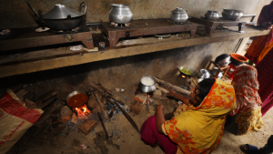 Women spend time with their children at a makeshift shelter set up for residents of coastal areas, in Teknaf, near Cox's Bazar, Bangladesh, Sunday, May 14, 2023. Bangladesh and Myanmar braced Sunday as a severe cyclone started to hit coastal areas and authorities urged thousands of people in both countries to seek shelter. (AP Photo/Al-emrun Garjon)